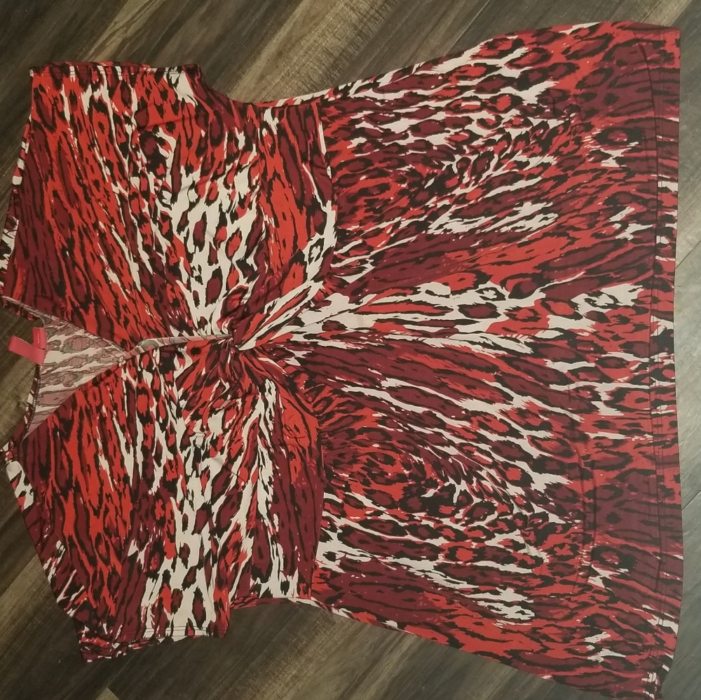 red/ black patterned shirt